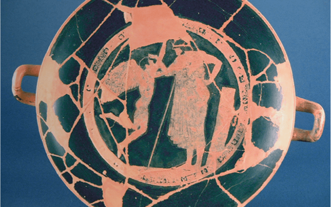 Coppa di Douris. Ceramica attica a figure rosse; all'interno Eros in volo che incorona un uomo barbato